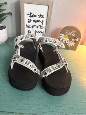 Teva Black Platform Sandals with White Patterned Straps